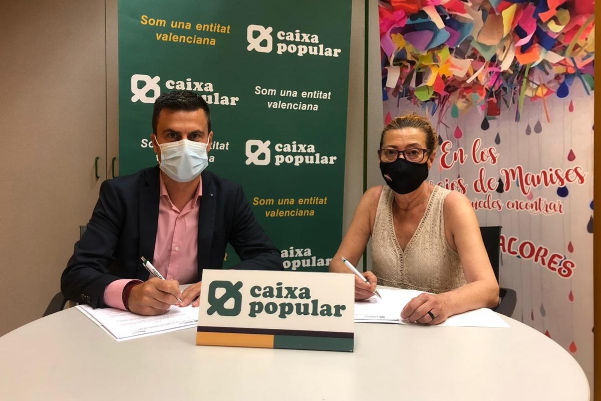 Firma del convenio entre ASCOMA y Caixa Popular en la oficina de Manises Firma del convenio entre ASCOMA y Caixa Popular en la oficina de Manises